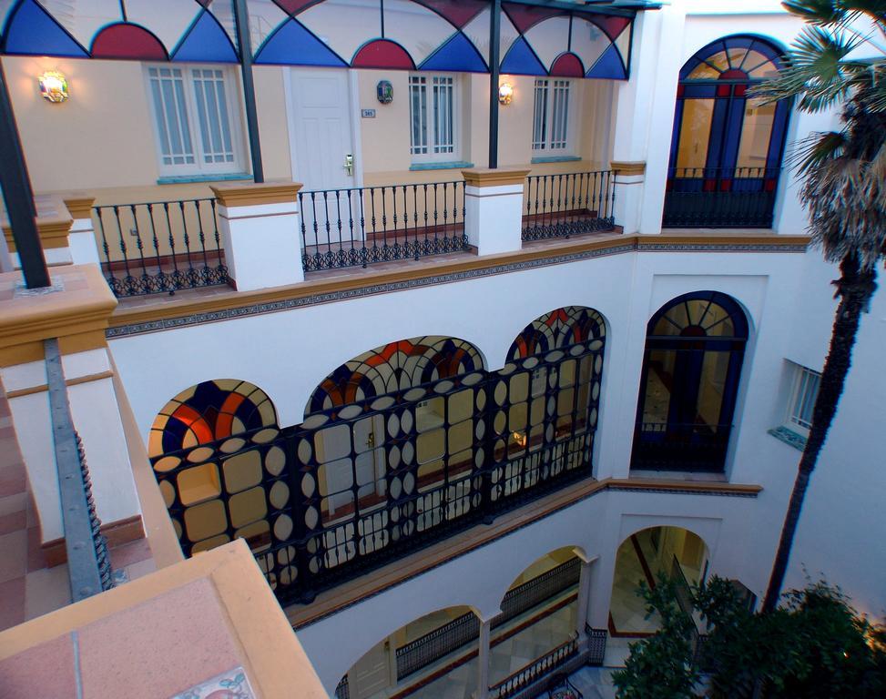 Hotel Cervantes Севилья Интерьер фото